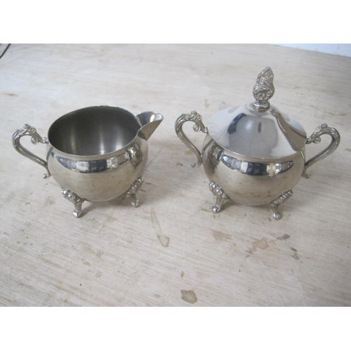 63 - Electroplated tea and coffee set comprising coffee pot, tea pot, milk jug, sugar bowl and engraved o... 