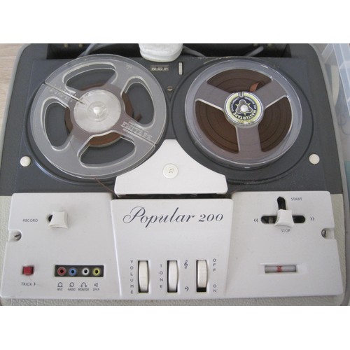 37 - A portable cased 'Reel to Reel Player with a selection of tapes