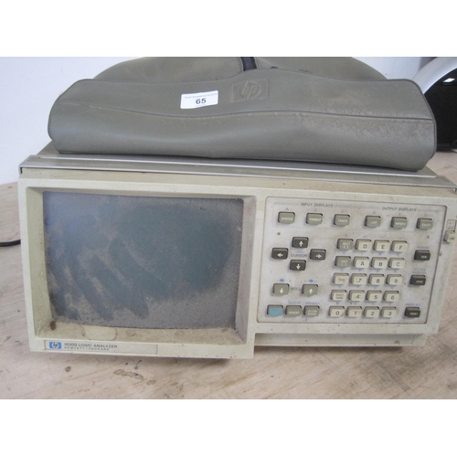 65 - HEWLETT PACKARD 1630G logic analyser with various accessories dusty but in reasonable condition