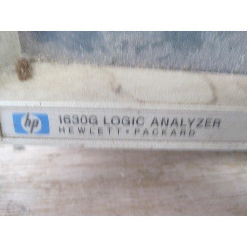 65 - HEWLETT PACKARD 1630G logic analyser with various accessories dusty but in reasonable condition