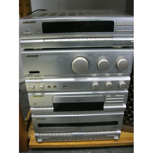 61 - A Sansui AX750 separates system and a pair of wooden framed SP35 Sansui Speakers, all in working ord... 