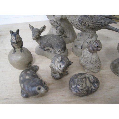 4 - A large Poole pottery stoneware owl along with a Merlin, Grouse ,small deer and other stoneware as p... 