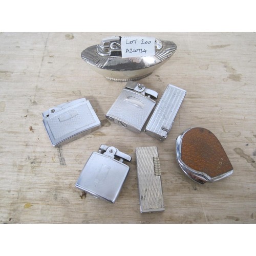 200 - An assortment of cigarette lighters - a Ronson table lighter (electroplating worn), a  Flaminaire Pa... 