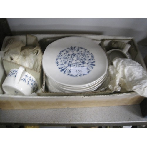 155 - Tachi Kichi Japanese porcelain tea ware and a boxed sake set, 'Arabesque', white with blue foliate p... 