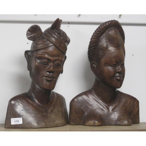 170 - Male and Female Balinese figures in a close-grained red hardwood.  Height approx. 14