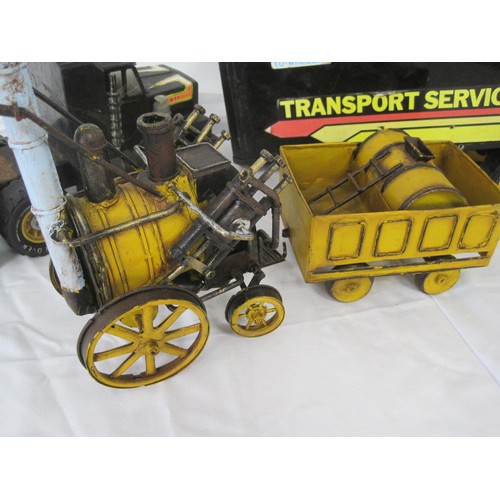 62 - Die cast toy truck and Stephensons rocket