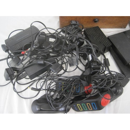 60 - A wooden box containing a pair of PS2 slim consoles, controllers, eye toy a power brick and an assor... 