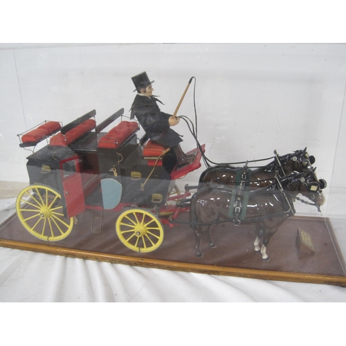 1 - A vintage model of an English Stage Coach and Horses in a perspex display mount with wooden base, in... 