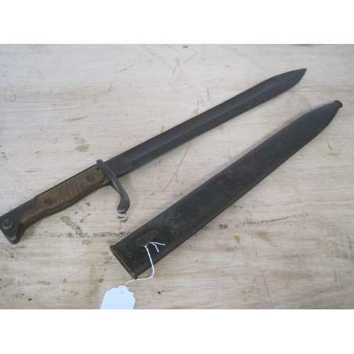 12 - A WW1 Imperial German model 1898/05 Butcher bayonet, 2nd pattern in its steel scabbard. Blade length... 