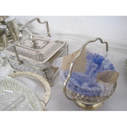 19 - An assortment of electroplated dining and table ware, including trays, goblets, egg cruets, cutlery,... 