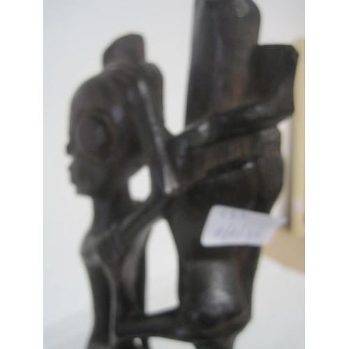 139 - A Makonde Tree of Life carved wooden totem figure (height 54cm)