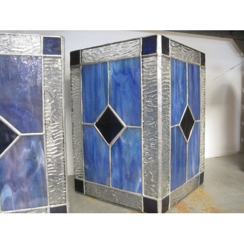 131 - A pair of leaded glazed light shades of rectangular shape, with blue and rippled glass panels. One i... 