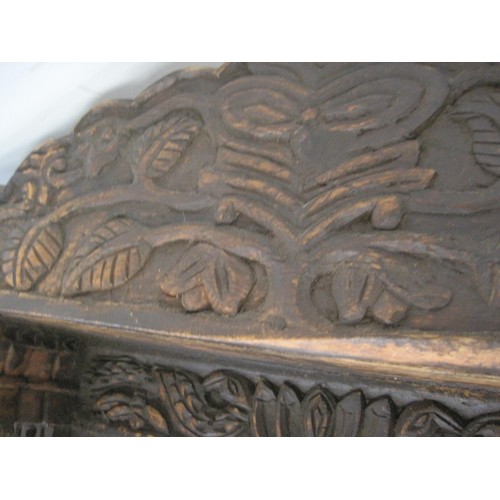 47 - Dark Wood, ornately carved mirror approx. 24in tall