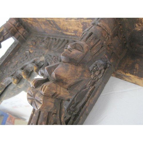 47 - Dark Wood, ornately carved mirror approx. 24in tall