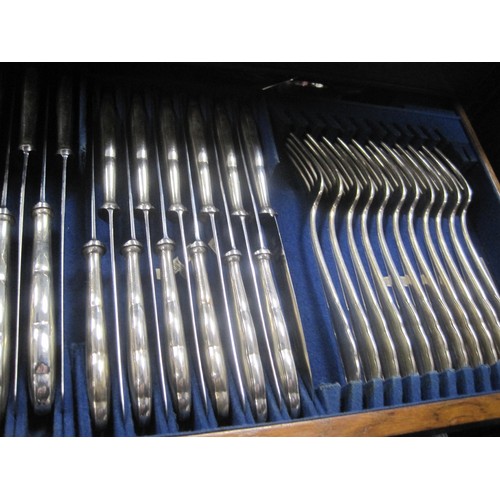 15 - An antique service of cutlery by WMF in an oak case, in good order