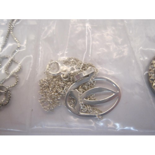 200 - Three necklaces and pendants  - (1) a Libra star sign pendant stamped silver on a chain. (2)a pierce... 