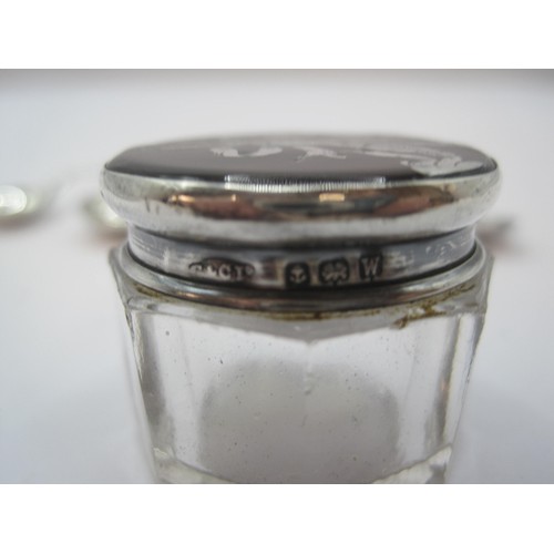 217 - A small octagonal cosmetics jar with tortoiseshell and silver inlaid lid, and three silver condiment... 