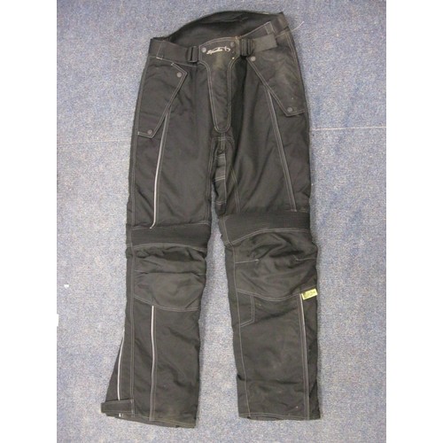 38 - A Gentleman's Euro brand teflon armoured size XXL motorcycling jacket and a similar pair of trousers... 