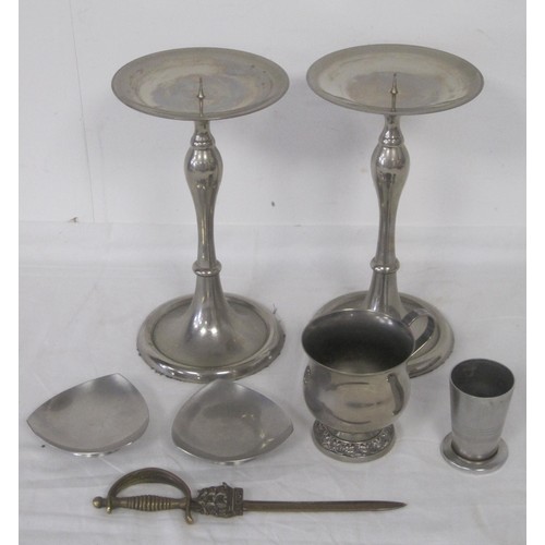 24 - Two candle sticks ,little 1/3 gill measure ,two triangular steel candle dishes, letter opener in bra... 