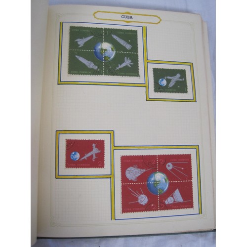 65 - A green Simplex Medium Stamp Album containing world stamps and one GB error stamp - a 1966 Christmas... 