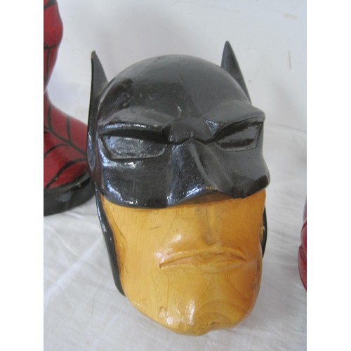 45 - four Wooden Carved Super Hero Heads