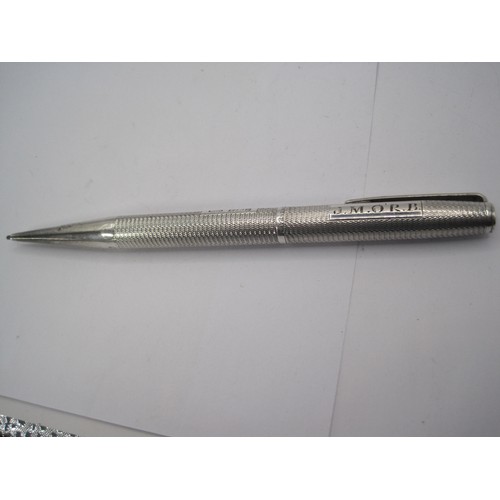 81 - A silver Notebook Cover and a Propelling Pencil