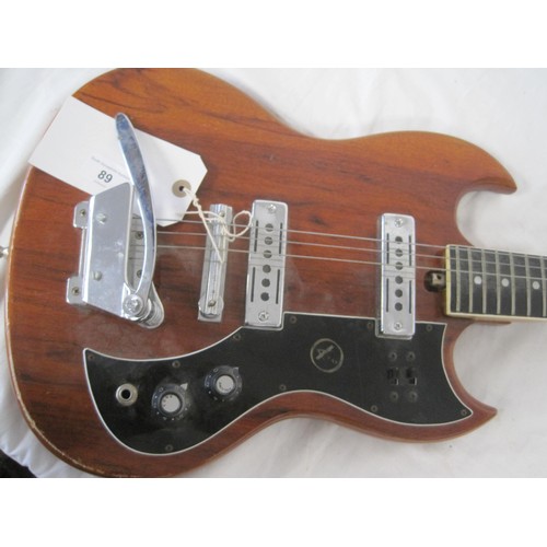 89 - An electric guitar, manufacturer name appears to be 'Kay' but wear to marking.