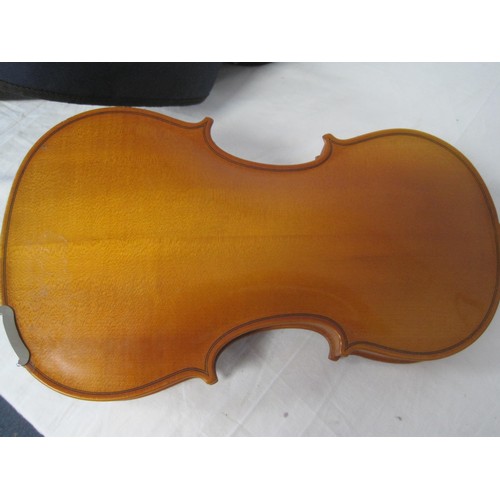 90 - A vintage cased violin, maker's name marked internally as Michael Poller, with bow.