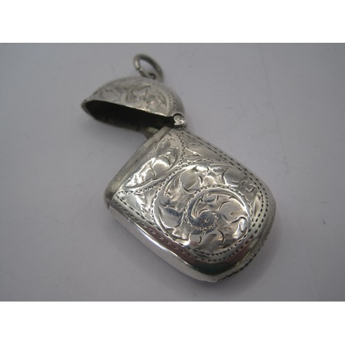 112 - A small silver vesta of rounded rectangular shape with suspension ring to hinged lid, engraved with ... 