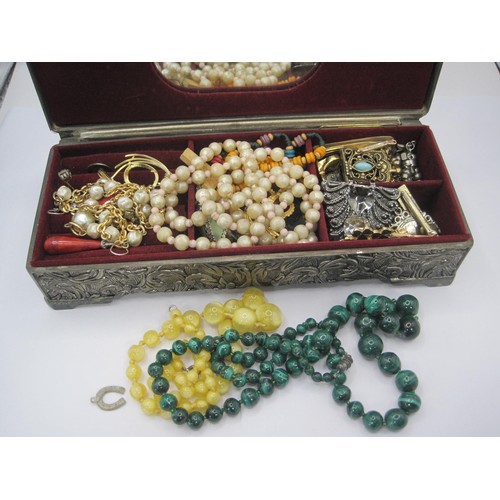 126 - A decorative metal jewellery box and contents of costume jewellery, a malachite bead necklace, a Tri... 