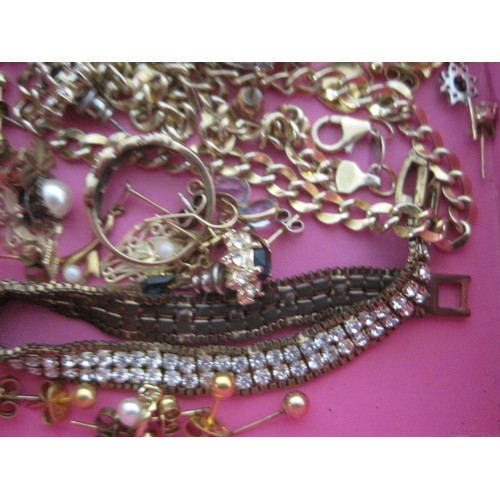 32 - A good selection of costume jewellery some we feel maybe gold plated including earring ,chains and a... 