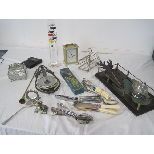 162 - A tray of interesting items including cutlery, figures, metalware etc