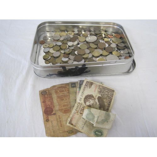 147 - A metal tub containing a quantity of coinage and banknotes including US $1 coins, Soviet coinage, Eu... 