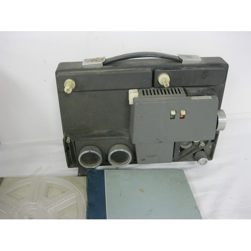 222 - Magnon 8mm projector along with another 8 mm projector ,various leads and reels of film and a film r... 