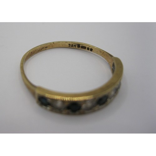 228 - A 9 carat gold eternity ring set with likely sapphires and zirconia, UK hallmarks, approx weight 1.4... 