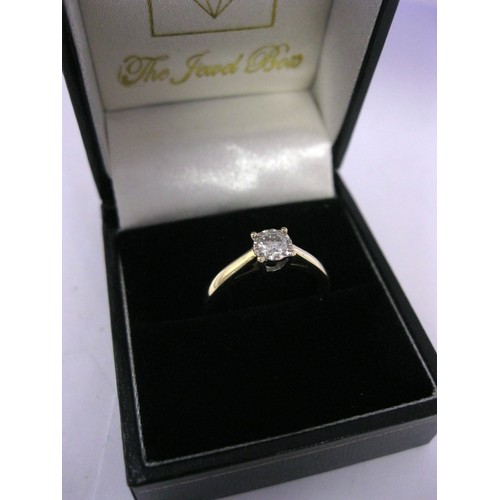 132 - A ladies 9 carat gold ring set with a 0.25 carat diamond, boxed, in good order