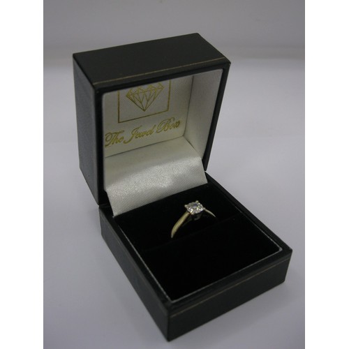 132 - A ladies 9 carat gold ring set with a 0.25 carat diamond, boxed, in good order