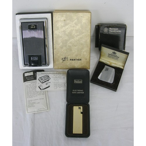 233 - 3 Vintage Lighters . (Boxed Ronson Varatronic) (Boxed Hadson Electronic Gas Lighter) (Piezo Electric... 