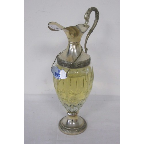 234 - A Glass Claret Style Jug containing Finest Bulgarian Whisky