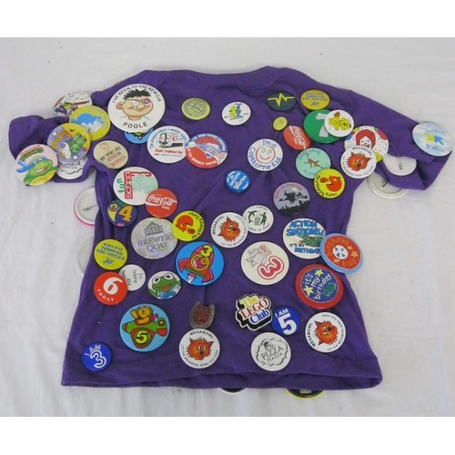 164 - Badges - about seventy-five badges pinned to a child's t-shirt (including I've been to the new C&A P... 