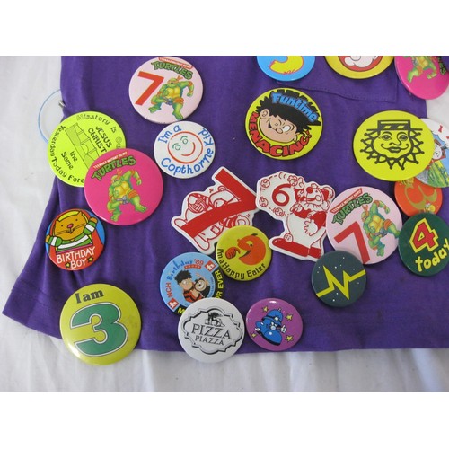 164 - Badges - about seventy-five badges pinned to a child's t-shirt (including I've been to the new C&A P... 