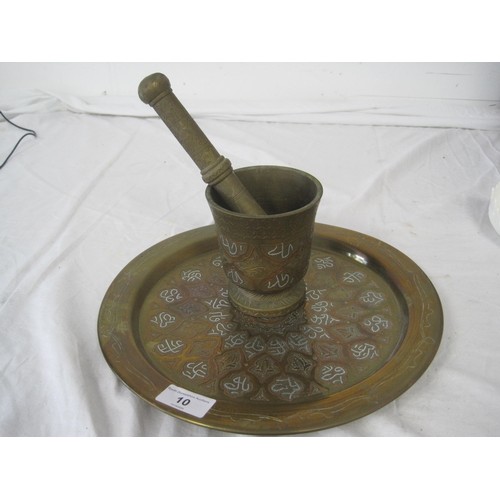 10 - A Tunisian engraved and inlaid brass mortar and pestle (height of mortar 11cm), and a similarly deco... 