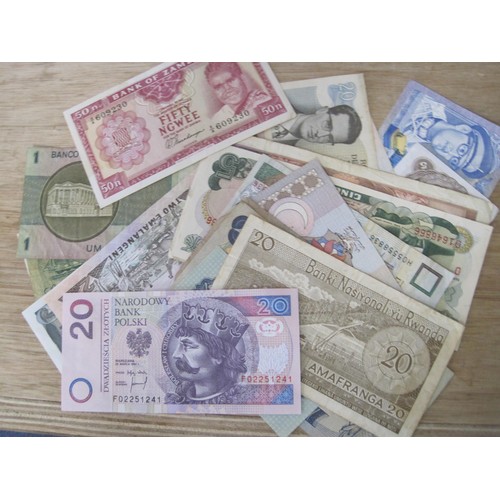 52 - A selection of Foreign Bank Notes including Brasil, Malawi, Pakistan etc.