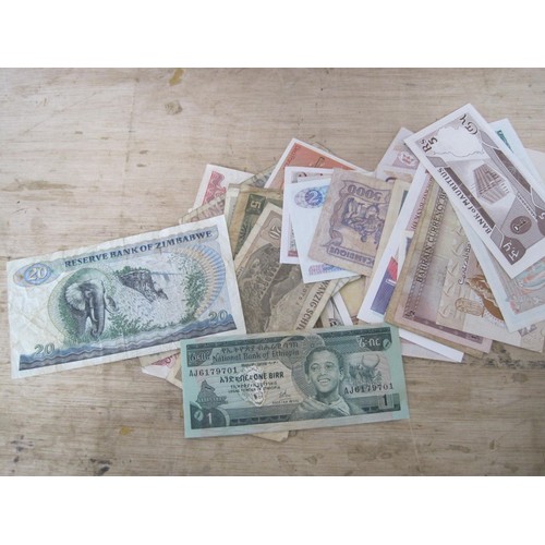 52 - A selection of Foreign Bank Notes including Brasil, Malawi, Pakistan etc.