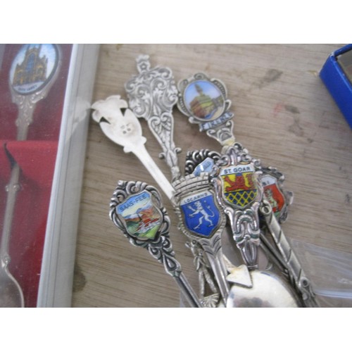 48 - Six European tourists white metal and enamel tourist's spoons stamped 800 (combined approx. 53g), an... 