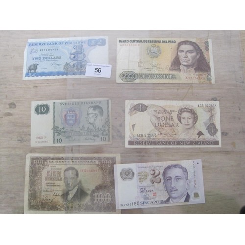 56 - A selection of UK and Foreign Banknotes, including Peru Botswana, Suriname, Madagascar etc.