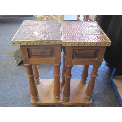 28 - A pair of side tables with hammered copper tops, in good order