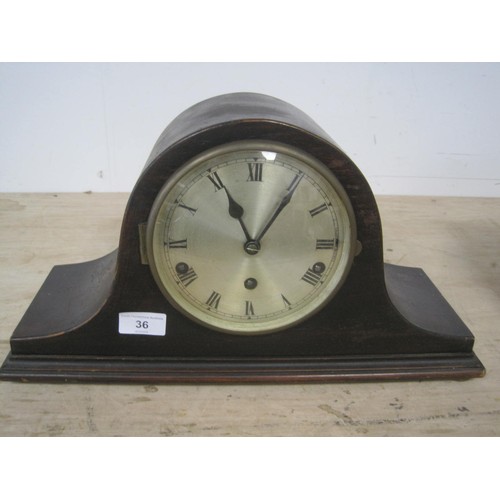 36 - A Napoleon top hat clock in working condition with Westminster chime