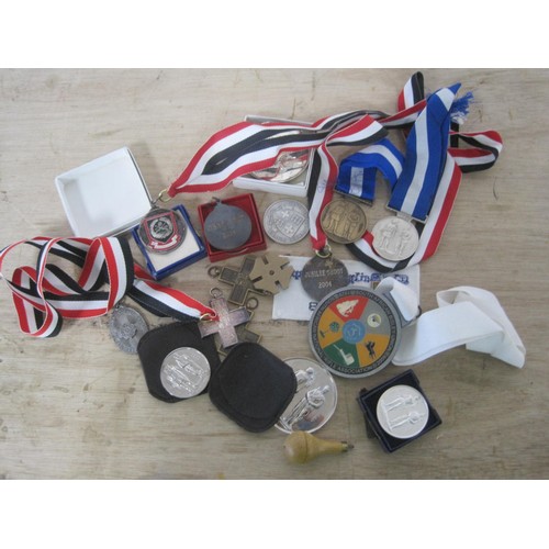 43 - A quantity of shooting prize medallions, medals and badges