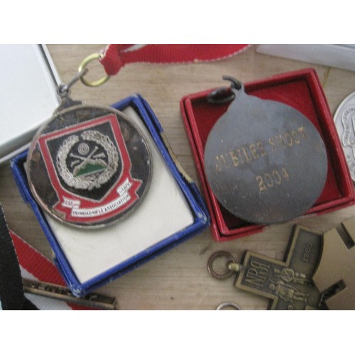 43 - A quantity of shooting prize medallions, medals and badges